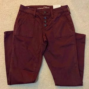 NWT Universal Thread Burgundy Mid Rise Skinny Pants.